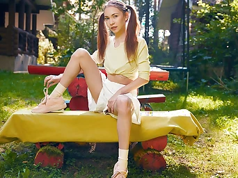 Cutie orgasms on a bench